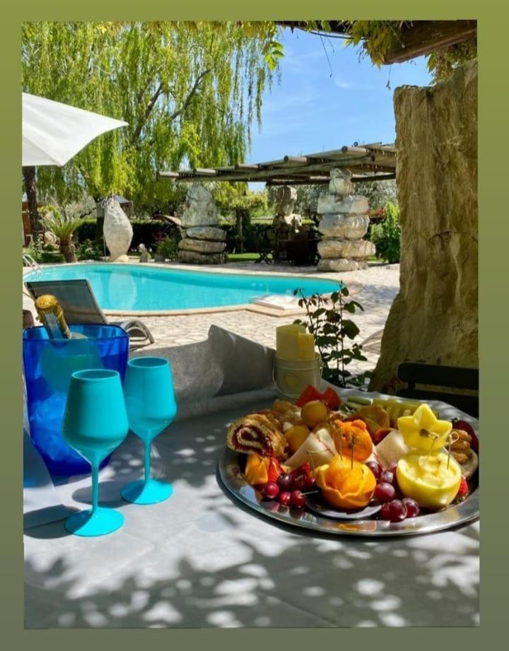 Il Giardino Dei Flintstones B&B เชร์เวเตรี ภายนอก รูปภาพ
